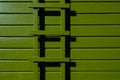 Avocado green painted exterior of wood house and trellis Royalty Free Stock Photo