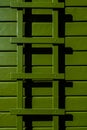 Avocado green painted exterior of wood house and trellis Royalty Free Stock Photo