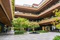 External Courtyard of a Retail Complex with Lush Greenery on Landscape Terraces