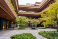 External Courtyard of a Retail Complex with Lush Greenery on Landscape Terraces