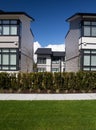 External facade of a row of colorful modern urban townhouses.brand new houses just after construction on real estate market Royalty Free Stock Photo