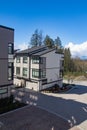 External facade of a row of colorful modern urban townhouses. brand new houses just after construction on real estate market Royalty Free Stock Photo