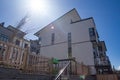 External facade of a row of colorful modern urban townhouses. brand new houses just after construction on real estate market Royalty Free Stock Photo