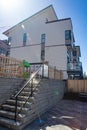 External facade of a row of colorful modern urban townhouses. brand new houses just after construction on real estate market Royalty Free Stock Photo