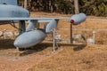 External fuel tanks on wing of military jet