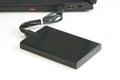 External hard disk connect to computer notebook Royalty Free Stock Photo
