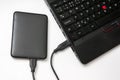 External hard disk HDD connected to laptop computer Royalty Free Stock Photo