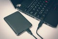 External hard disk HDD connected to laptop computer Royalty Free Stock Photo