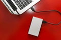 External hard drive connected to laptop Royalty Free Stock Photo