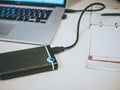 External hdd ssd connected to the laptop Royalty Free Stock Photo