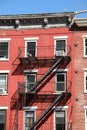 external metal stairway serving as fire escape and emergency exit in an american Royalty Free Stock Photo