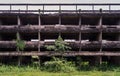 External of old abandoned building and was left to deteriorate over time and visible parts of structural elements and ruins Royalty Free Stock Photo