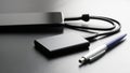 External portable SSD connected to smartphone on dark background next to pen. Portable Solid State Drive. OTG connection. Concept Royalty Free Stock Photo