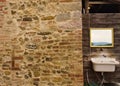 An external sink under a mirror in the garden of a farmhouse in the countryside Umbria, Italy