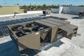 External unit of commercial air conditioning and ventilation system installed on industrial building roof. Exhaust vent