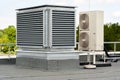 The external units air conditioning and ventilation systems installed on the flat roof Royalty Free Stock Photo