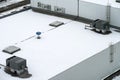 The external units of the commercial air conditioning and ventilation systems are installed on the roof of an industrial building. Royalty Free Stock Photo