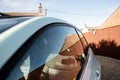 External view of a small italian made car showing the passenger seat through the door window. Royalty Free Stock Photo