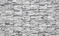 External wall covering made of stoneware with rock effect. Colors are shades of gray Royalty Free Stock Photo