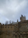 External walls of the Hohenzollern Castle with entrance and tower inthe bachground