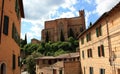 External walls of the monument church of san domenico among the narrow streets of the enchanting medieval siena