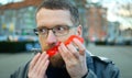 OLOMOUC, CZECH REPUBLIC, JANUARY 10, 2019: Extinction rebellion activist man Frantisek Kotas protest sealed mouth with