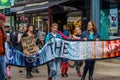 Campaigners March in a Town Centre. Royalty Free Stock Photo