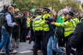 Extinction Rebellion protester arrested by police forces in Trafalgar Square London