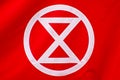 Extinction Rebellion sign in white on red