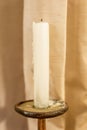 Extinguished candle in candlestick Royalty Free Stock Photo