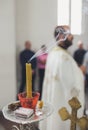 Extinguished candle with smoke in an Orthodox church Royalty Free Stock Photo