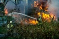 extinguishing the fire of a wooden house