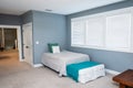 An extra bed for guests in a new construction upstairs bonus room Royalty Free Stock Photo