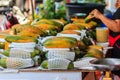 Extra jumbo size of ripe big yellow papaya fruit wrapped in protective net for sale at the fruit market in Bangkok, Thailand. Org