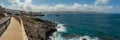 Extra large panorama from La Isleta an warm sunny day with briht blue sky and white clouds. Las Palmas, Las Canteras beach, Gran