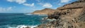 Extra large panorama from La Isleta an warm sunny day with briht blue sky and white clouds. Las Palmas, The Confital beach, Gran