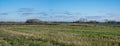 Extra large panoramic view over green meadows and cereal agriculture fields, Belgium