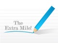 The extra mile sign written on a notepad