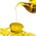 Extra olive oil falling Royalty Free Stock Photo