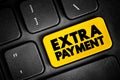 Extra Payment - small amount of money that you give to someone in addition to what you owe for a service, text button on keyboard Royalty Free Stock Photo