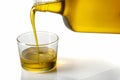 Extra virgin olive oil being poured from bottle Royalty Free Stock Photo