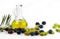 Extra virgin olive oil with fresh olives. Royalty Free Stock Photo