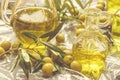 Extra virgin olive oil glass jar and olives, summer Royalty Free Stock Photo