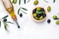 Extra virgin olive oli and green and black olives Royalty Free Stock Photo