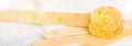 Extra wide banner background with sugar paste or wax honey for hair removing and wooden waxing spatula sticks - depilation and