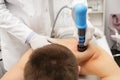 Extracorporeal Shockwave Therapy ESWT.Non-surgical treatment.Physical therapy for neck and back muscles,spine with shock