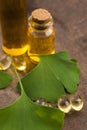 Extract oil of ginseng root and ginkgo biloba leaves Royalty Free Stock Photo