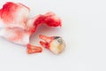 Extraction of decayed tooth with bloody gauze pad on white background. health concept.