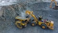 extraction and loading process of rock material from quarry Royalty Free Stock Photo