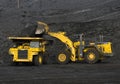 The job of a loader in the coal mine.